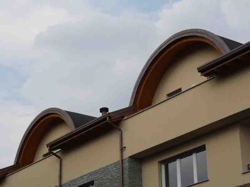 Dettaglio lattoneria rotonda in Rame 8/10. Palazzina ad Olgiate Olona.